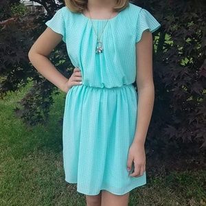 Adorable girl's dress with necklace